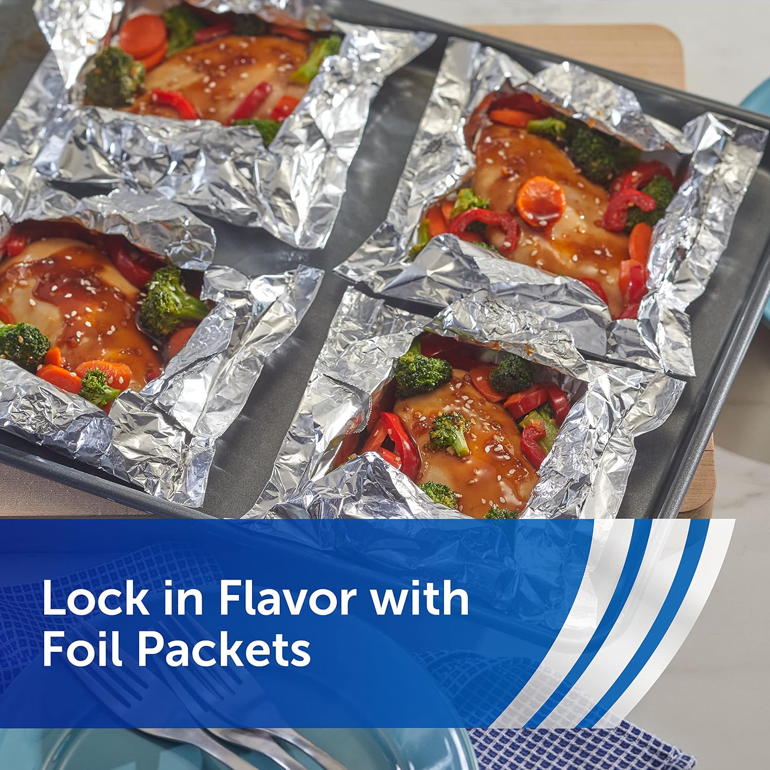 Reynolds Wrap Everyday Strength Aluminum Foil Roll, Freezer Safe and Grill Safe, Great for Foil Packets and Home Cooking, 12 Inches Wide, 200 Total Sq. Ft.